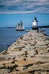 Sailboat Passes Spring Point Ledge Light by Breakwater